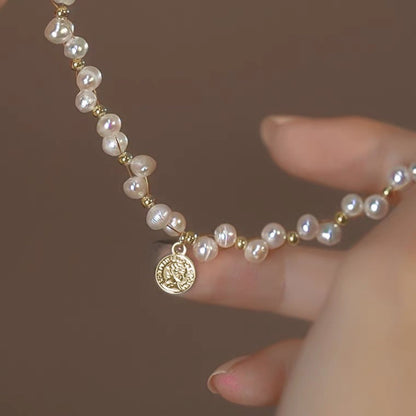 Pearl Bracelet with Coin Pendant