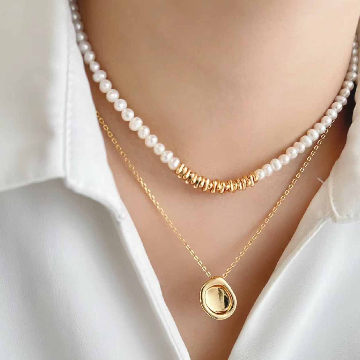 Pearl Necklace with Oval Silver Pendant